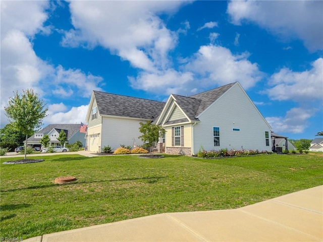109 Red Maple Way, King, NC 27021 - view of front of home with a front lawn, a garage, and a shingled roof