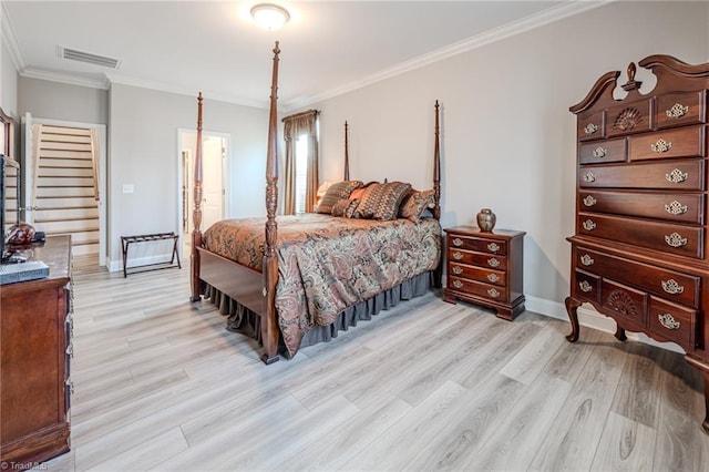109 Red Maple Way, King, NC 27021 - bedroom featuring light wood finished floors, ornamental molding, and baseboards