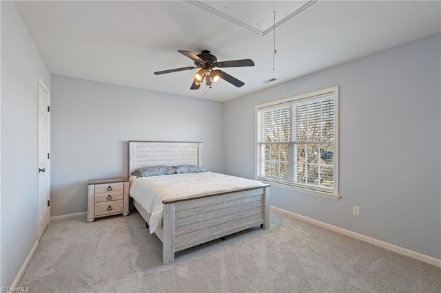 bedroom featuring light colored carpet and ceiling fan