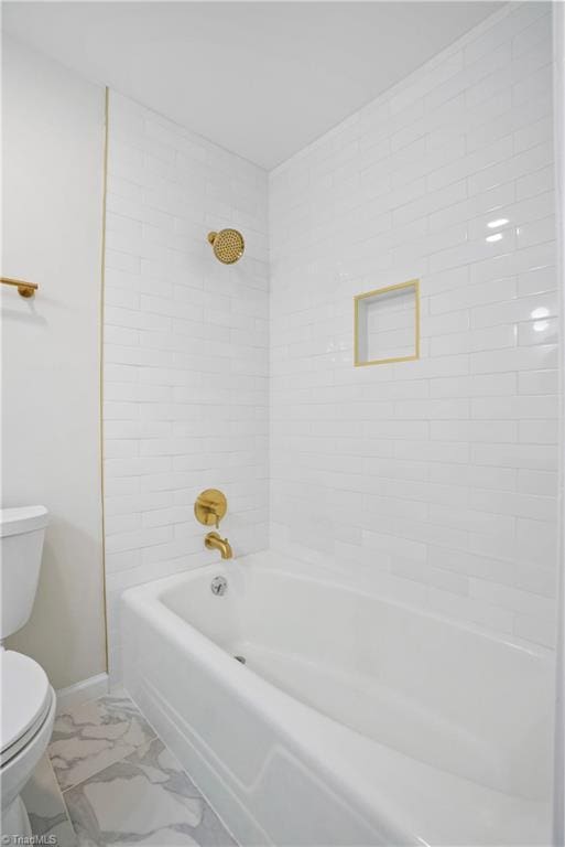 bathroom featuring shower / tub combination, toilet, baseboards, and marble finish floor