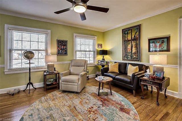 sitting room featuring crown molding, hardwood / wood-style floors, and ceiling fan