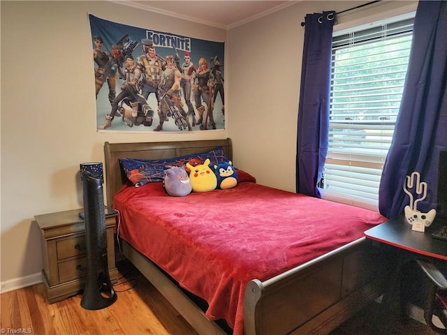 6905 Harlow Dr, Archdale, NC 27263 - bedroom with wood finished floors, crown molding, and baseboards