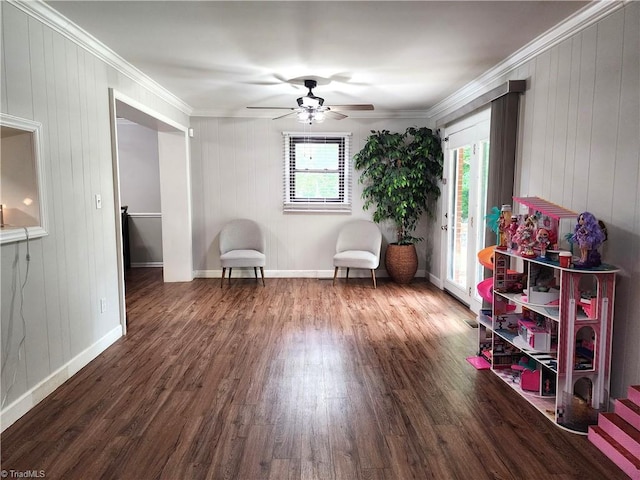 6905 Harlow Dr, Archdale, NC 27263 - sitting room featuring wood finished floors, crown molding, ceiling fan, baseboards, and wooden walls