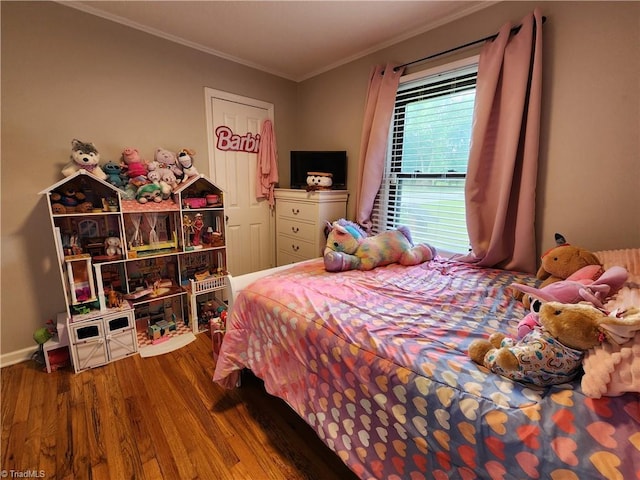 6905 Harlow Dr, Archdale, NC 27263 - bedroom with wood finished floors, ornamental molding, and baseboards