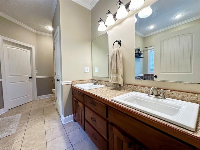 bathroom featuring vanity, crown molding, toilet, and tile patterned floors