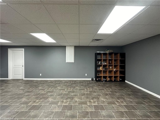 basement with a drop ceiling