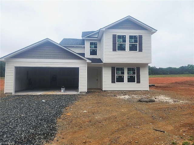 2892 Tysinger Rd, Denton, NC 27239 - view of front of house featuring a garage and gravel driveway