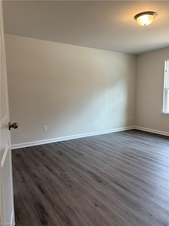 2892 Tysinger Rd, Denton, NC 27239 - empty room with dark wood-type flooring and baseboards