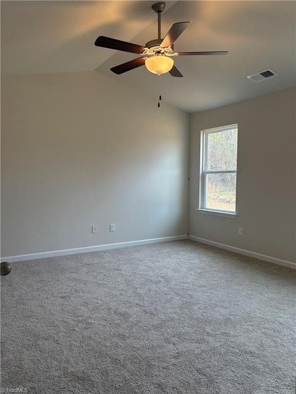 2892 Tysinger Rd, Denton, NC 27239 - unfurnished room featuring carpet flooring, baseboards, a ceiling fan, and vaulted ceiling