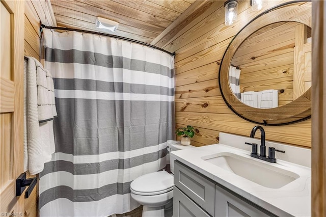 bathroom with wood walls, vanity, toilet, wood ceiling, and curtained shower