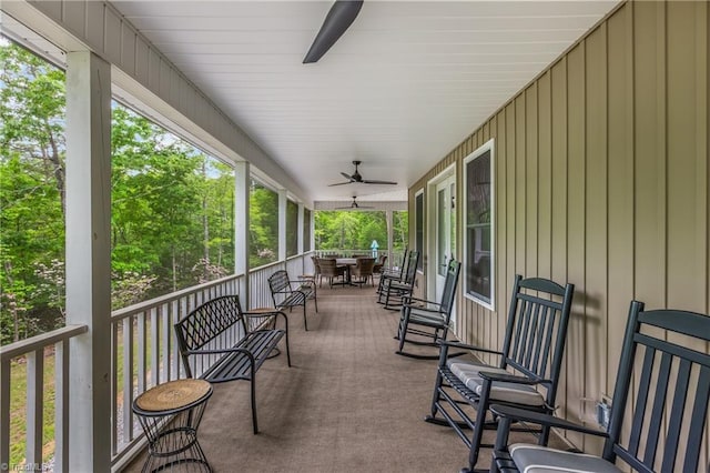 view of patio featuring a ceiling fan and outdoor dining space