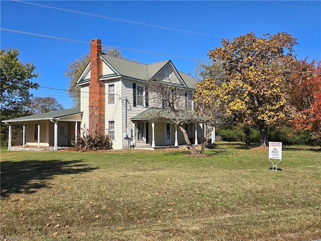 view of home's exterior with a lawn