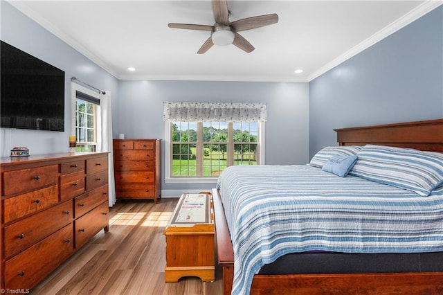 6147 Olde Fields Way, Pfafftown, NC 27040 - bedroom featuring wood finished floors, ornamental molding, recessed lighting, and ceiling fan