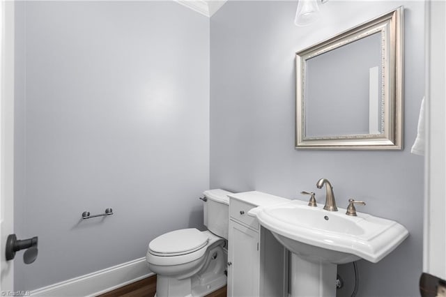 6147 Olde Fields Way, Pfafftown, NC 27040 - bathroom with ornamental molding and wood finished floors