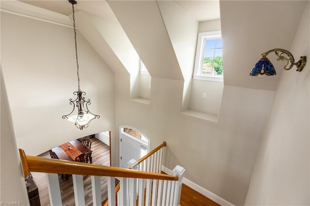 6147 Olde Fields Way, Pfafftown, NC 27040 - stairs featuring wood finished floors and a chandelier