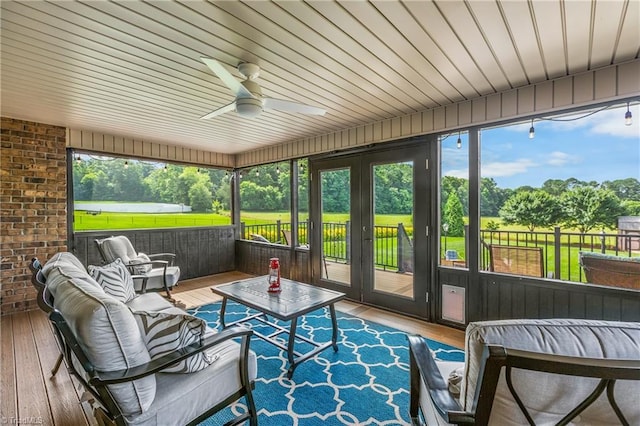 6147 Olde Fields Way, Pfafftown, NC 27040 - sunroom with french doors, ceiling fan, an outdoor living space, and view of scattered trees
