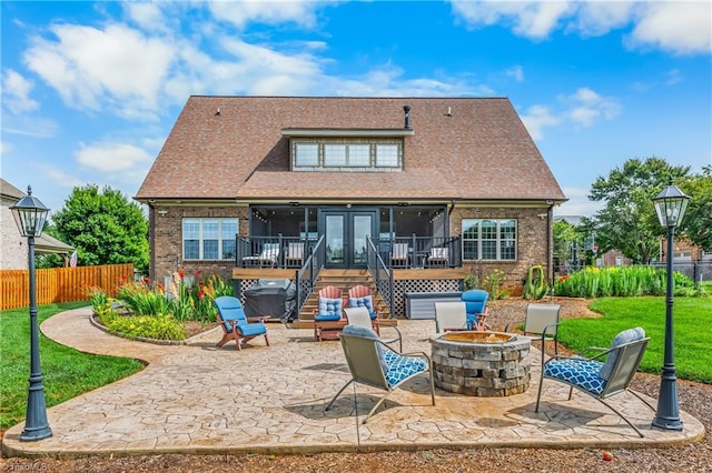 6147 Olde Fields Way, Pfafftown, NC 27040 - rear view of property with an outdoor fire pit, a patio, brick siding, and stairway