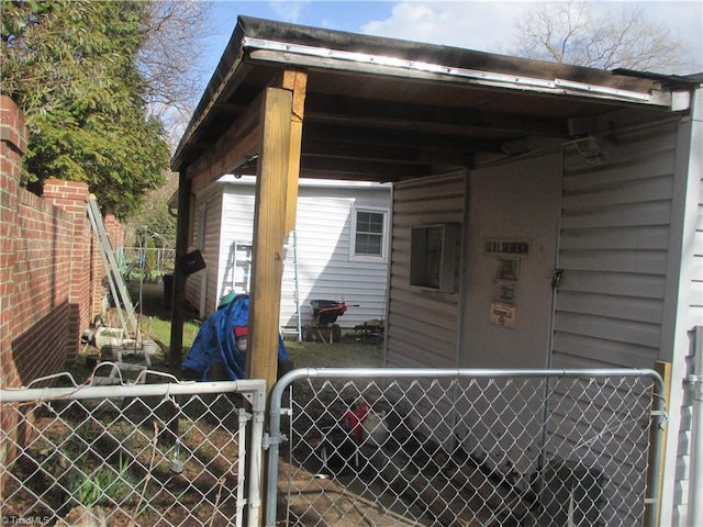 exterior space with a gate and fence