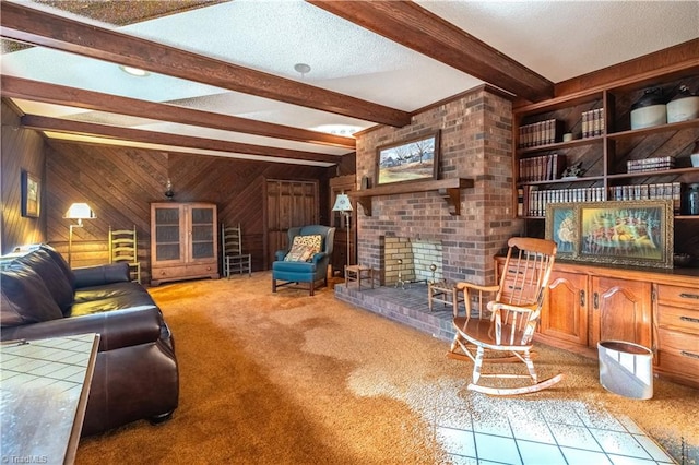 living room featuring a textured ceiling, light colored carpet, wooden walls, and beam ceiling