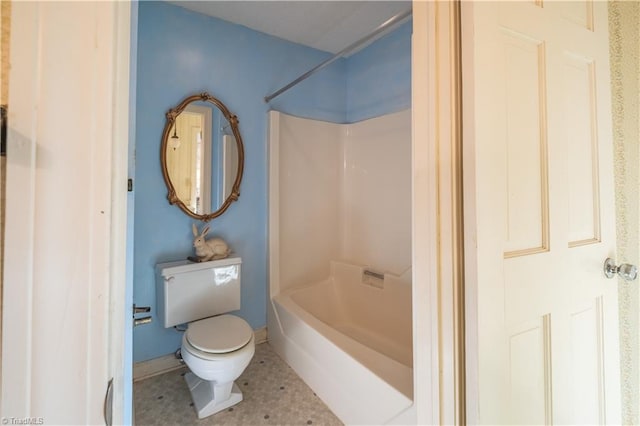 bathroom with toilet and shower / bathtub combination