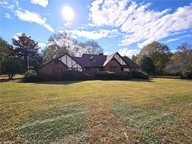 exterior space with a yard