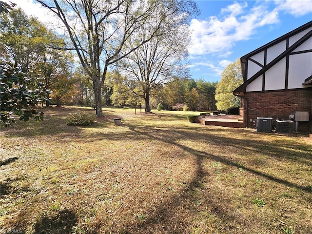 view of yard with central AC unit