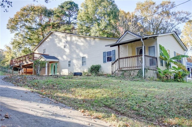 view of home's exterior with a lawn