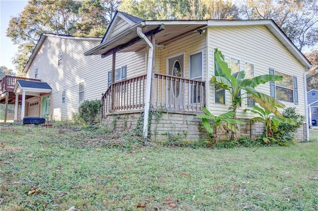 view of property exterior featuring a yard