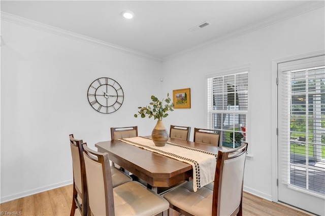 817 Sage Hill Dr, Jamestown, NC 27282 - dining space with healthy amount of natural light, light wood-type flooring, crown molding, and recessed lighting