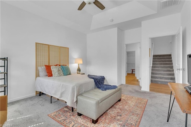 817 Sage Hill Dr, Jamestown, NC 27282 - bedroom featuring carpet, a raised ceiling, and a ceiling fan