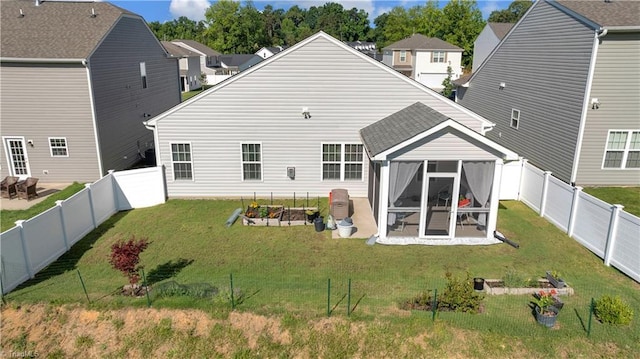 817 Sage Hill Dr, Jamestown, NC 27282 - rear view of house with a sunroom, a fenced backyard, and a residential view