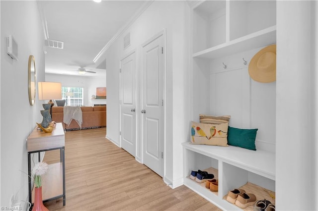 817 Sage Hill Dr, Jamestown, NC 27282 - mudroom with wood finished floors, ceiling fan, and crown molding