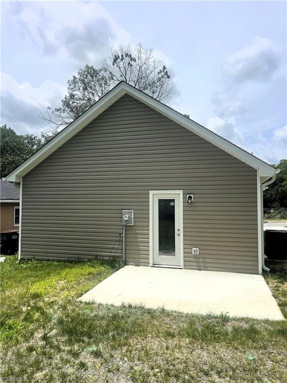 505 White Oak St, High Point, NC 27260 - rear view of property with a patio area and a yard
