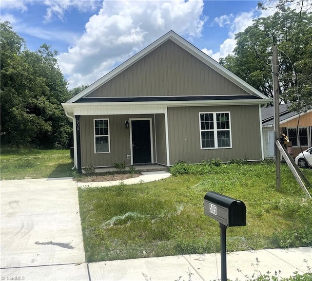 505 White Oak St, High Point, NC 27260 - bungalow featuring covered porch and a front lawn