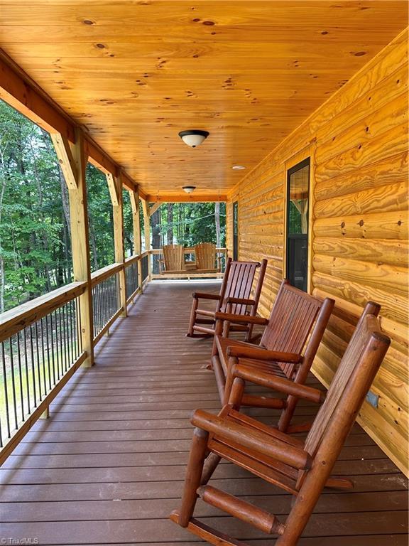 wooden terrace with covered porch