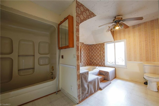 bathroom with toilet and ceiling fan