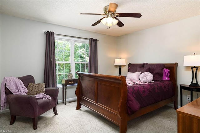 3714 Courtland Cir, Thomasville, NC 27360 - bedroom with light colored carpet, ceiling fan, and a textured ceiling