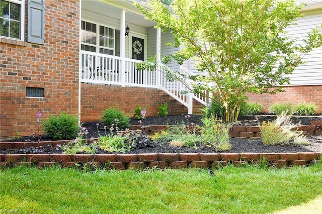 3714 Courtland Cir, Thomasville, NC 27360 - view of exterior entry featuring covered porch and brick siding