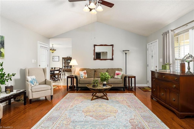 3714 Courtland Cir, Thomasville, NC 27360 - living room featuring a ceiling fan, vaulted ceiling, and dark wood-style floors