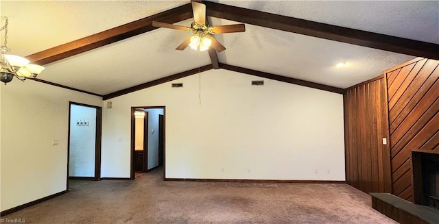 unfurnished living room featuring visible vents, ceiling fan with notable chandelier, lofted ceiling with beams, carpet flooring, and baseboards