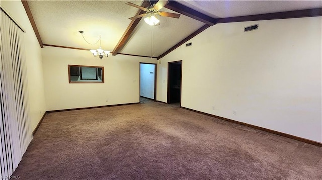 carpeted empty room with lofted ceiling with beams, baseboards, and visible vents