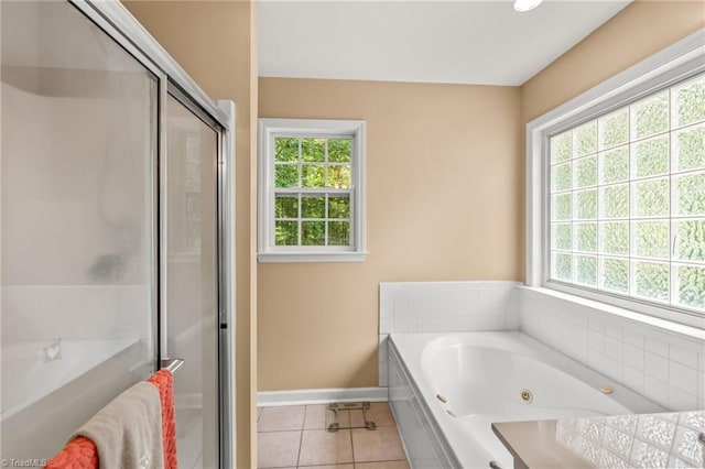 5805 Pine Hall Rd, Walnut Cove, NC 27052 - bathroom featuring tile patterned flooring, a whirlpool tub, baseboards, and a shower stall