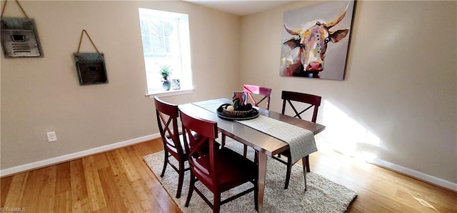 dining room featuring light hardwood / wood-style floors