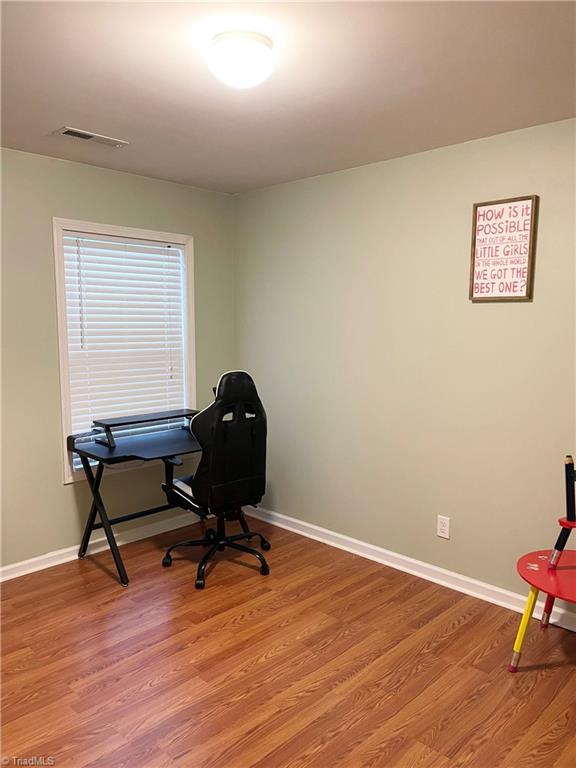 home office featuring light wood-type flooring