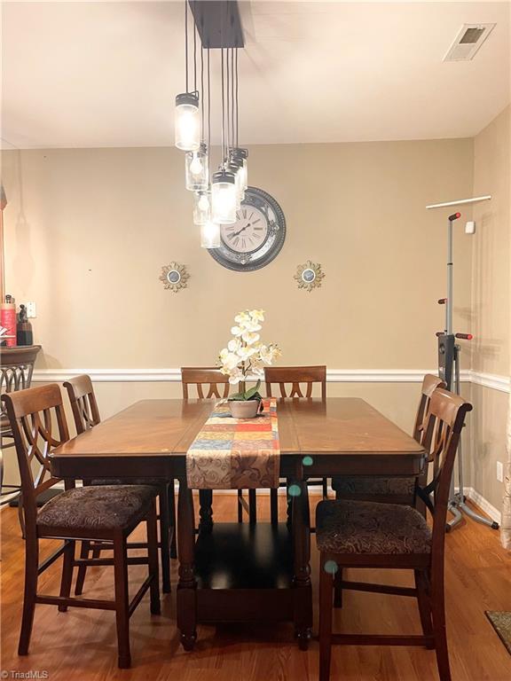 dining room featuring hardwood / wood-style flooring