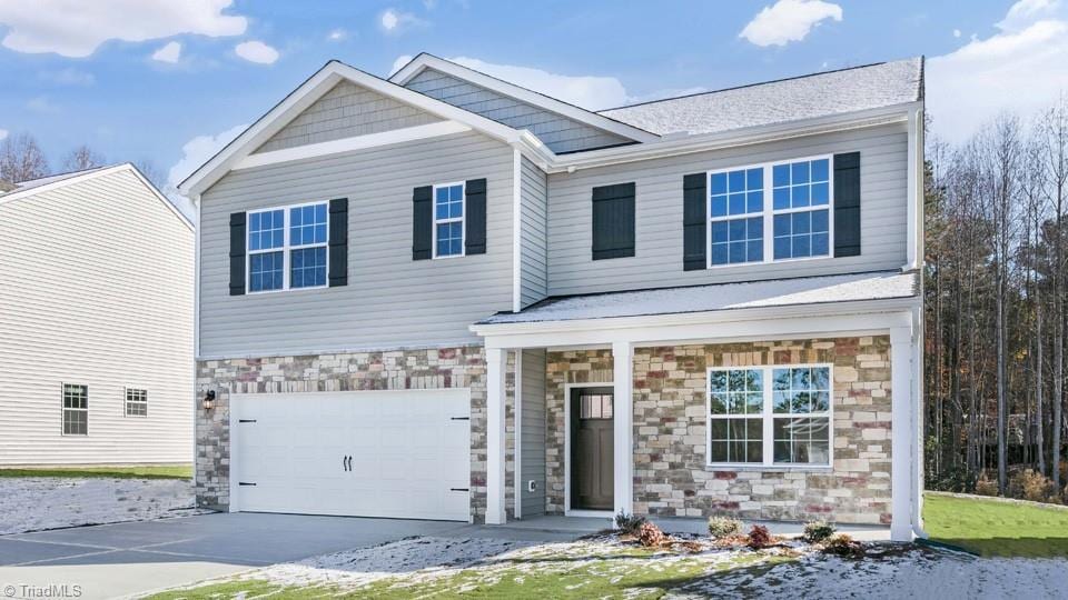 craftsman house featuring a garage