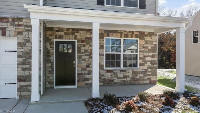 property entrance with a porch