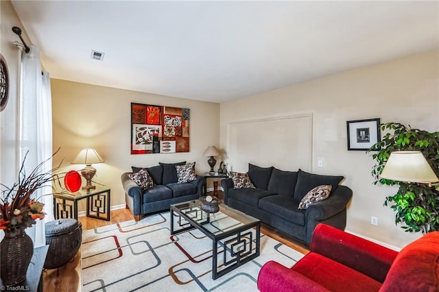 living room featuring light wood-type flooring