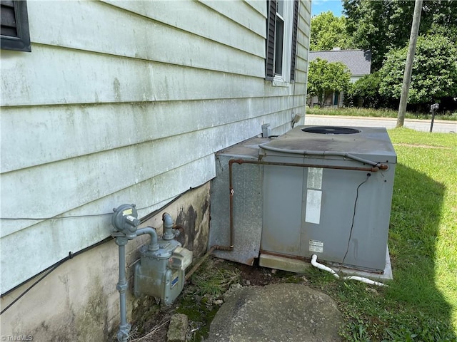 705 Washington St, Graham, NC 27253 - exterior view of gas meter and central AC