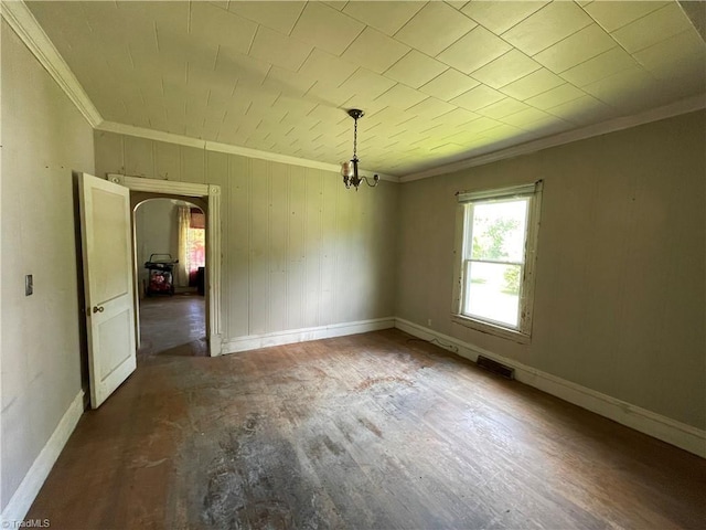 705 Washington St, Graham, NC 27253 - empty room with ornamental molding, arched walkways, and baseboards